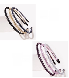 Macro detail of crystal beaded headbands in black, navy, yellow, purple, pink and white