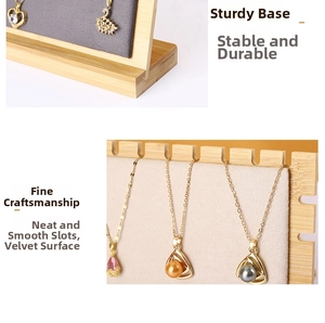 Detail of wooden necklace display stand featuring premium bamboo base and velvet padding
