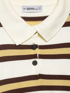 Close-up of polo neck detail with buttons and tricolor striped knit fabric texture
