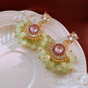 Vintage fan-shaped tassel earrings in gold with pink crystals and light green faceted beads