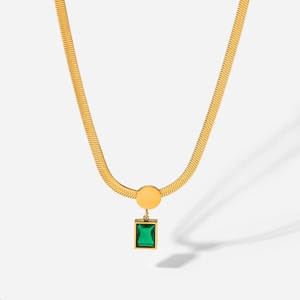 Detail of 18K gold stainless steel snake chain with a green square zircon pendant