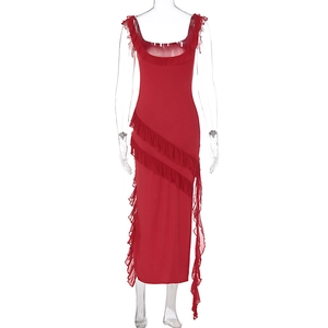 Detail of red slim fit dress showing ruffled trim neckline and asymmetrical side slit