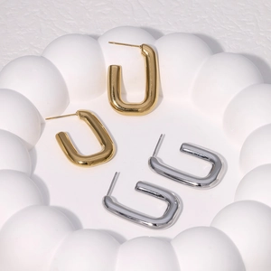 Minimalist U-shaped stainless steel earrings in 18K gold and silver polished finishes