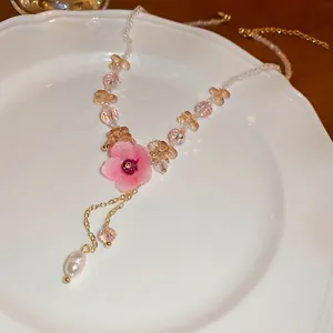 Elegant floral necklace with pink flower, amber crystal beads and white baroque pearl pendant