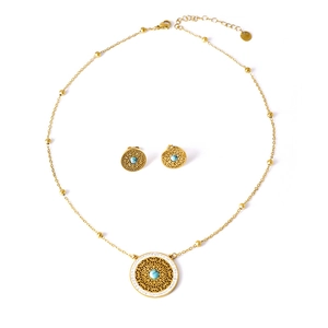 Vintage hollow gold jewelry set with turquoise necklace and matching tree earrings