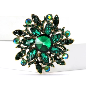 Elegant vintage gold brooch with green crystals and rhinestones for women's suits