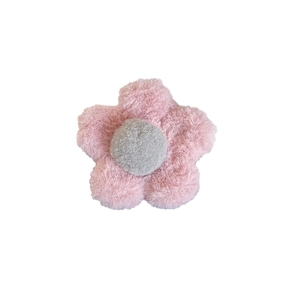 Plush flower hair claw clip in pink and grey for elegant winter hairstyles