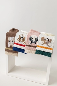 Detail view of four-pair colorful animal embroidery five-toe yoga socks on display