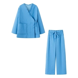 Women's blue quilted loungewear set featuring a kimono-style top and wide-leg trousers