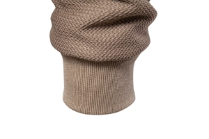 Macro shot of men's casual jacket showing waffle knit fabric and ribbed cuff texture