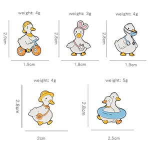 Size and weight specifications for cute cartoon duck enamel pins in various poses