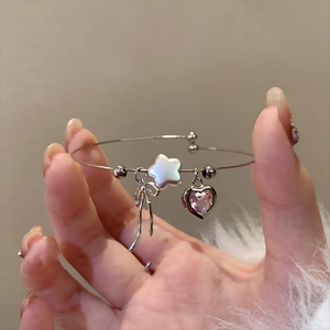 Silver open bangle with zircon bow, pink heart crystal and white star charms