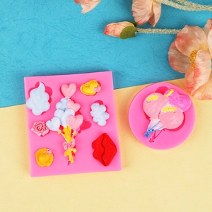 Pink silicone DIY molds with balloon heart and flower shapes for fondant cake decorating