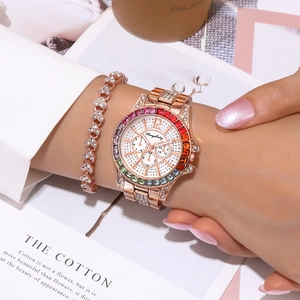 Elegant rose gold women's watch with rainbow rhinestone bezel and starry pave dial.