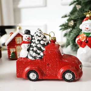 Festive red vintage truck ornament with snowman and snowy Christmas tree decoration