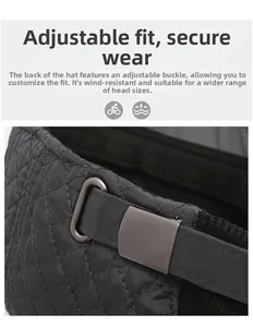 Detail of adjustable metal buckle and strap on black quilted winter hat for men