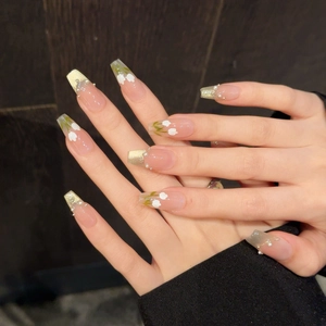 Faux ongles faits main œil de chat perlé avec paillettes dorées et motifs de tulipes