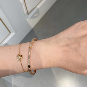 Luxury 18K gold plated honeycomb bangle and clover bracelet set for elegant women