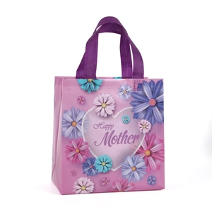 Pink floral non-woven tote bag with Happy Mother text and purple handles