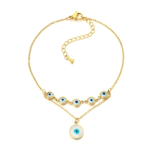 Golden double-layer evil eye anklet with blue and white diamond-encrusted shell pendants