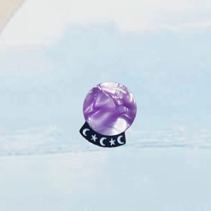 Purple marble acrylic round hair clip with celestial moon and star pattern design