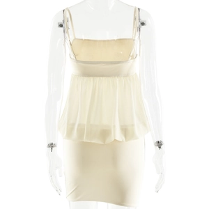 Detail view of beige strappy mini dress with back ruffles on a studio mannequin