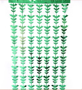 Detailed full view of a green bat-shaped tinsel curtain for Halloween party background