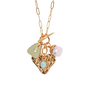 Gold necklace with T-bar clasp featuring heart charm, green enamel triangle, and white pearl