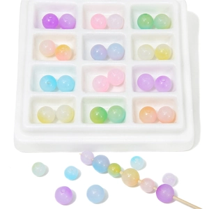 Colorful acrylic jelly round beads displayed in a white organizer tray for DIY jewelry
