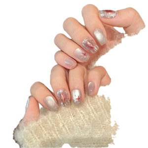 Silver grey cat eye press-on nails with red star accents and square shape glossy finish