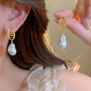 French vintage gold plated earrings with baroque pearl drop and hollow design