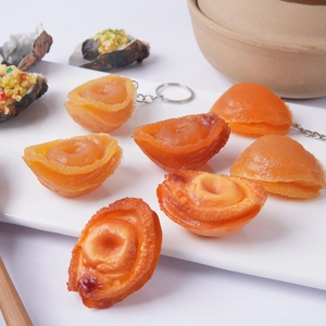 Realistic large abalone food model keychain with glossy finish and lifelike texture