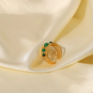 Waterproof gold plated stainless steel ring with natural green malachite on silk fabric
