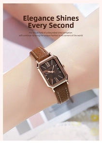 Elegant rose gold square watch with brown leather strap worn on wrist in warm home setting