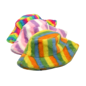Detailed plush texture of rainbow striped faux fur bucket hats for women in winter