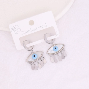 Stainless steel evil eye drop earrings with long fringe pendants on white fabric
