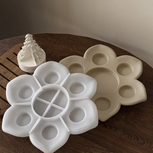 Detailed top view of lotus-shaped silicone mold with multiple slots for DIY resin crafts