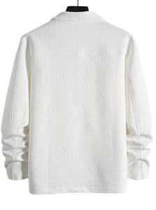 Detail view of the geometric jacquard texture and white fabric on the back of the jacket