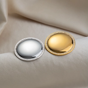 Polished 18K gold and silver dome stud earrings with sparkling crystal border