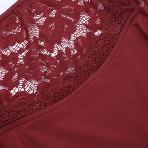 Detailed close-up of dark red lace patterns and premium knitted fabric stitching details