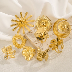 Gold bohemian flower rings set with geometric butterfly sun and rhinestone designs