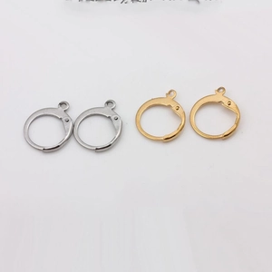 Detail showing gold and silver round earring hoops and metal findings for DIY jewelry