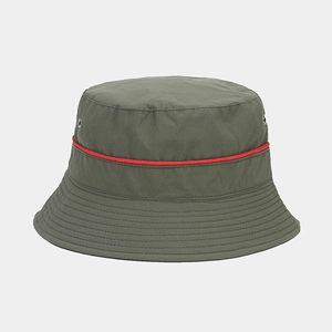 Detail of waterproof bucket hat showing red decorative trim and metal ventilation eyelets