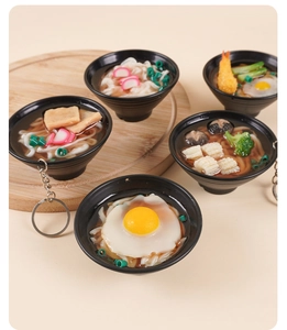 Variety of 7cm miniature udon noodle bowls with different toppings and keychains