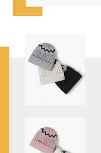Close-up of color-block striped knit beanies with thick fleece lining for winter