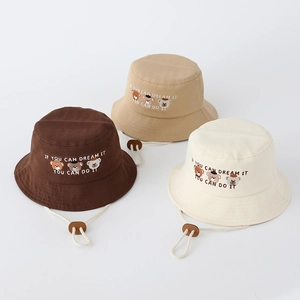 Three children's bear embroidery bucket hats in coffee, khaki, and cream cotton canvas