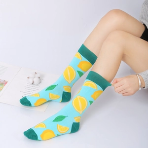 Creative light blue cotton crew socks featuring yellow lemon patterns for men and women