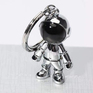 Polished silver astronaut keychain made of high-quality zinc alloy with a mirrored finish