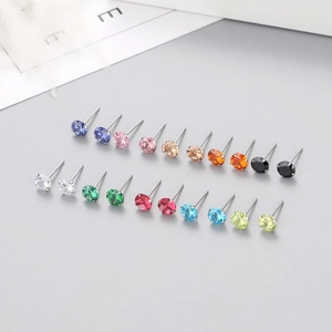 Set of minimalist 925 sterling silver stud earrings with colorful zircon stones in four-prong setting