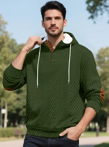 Détails du sweat à capuche tricoté vert foncé avec motif losanges et coudières brunes